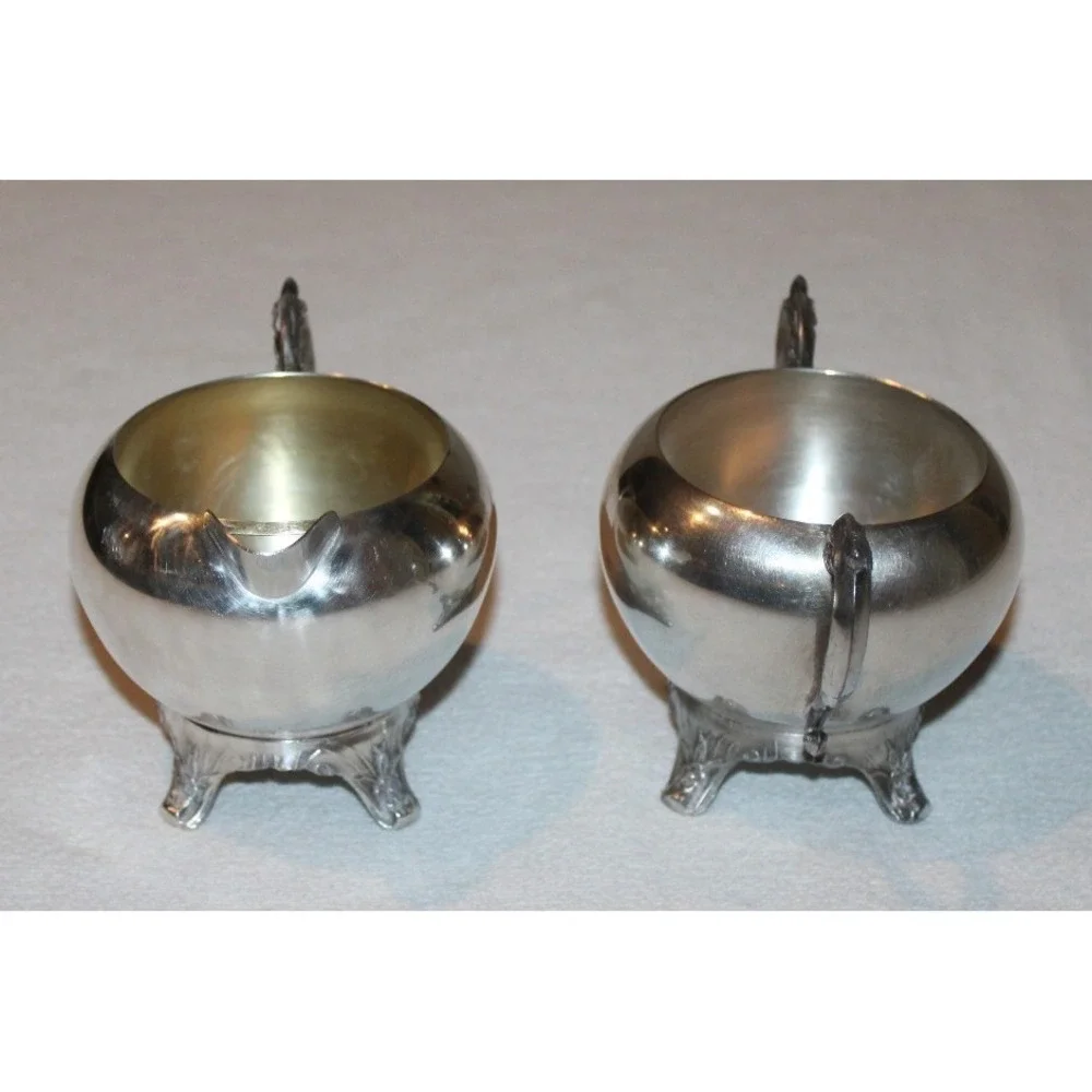 vintage F.B. Rogers Silver Co. silverplated creamer & sugar set with lid footed